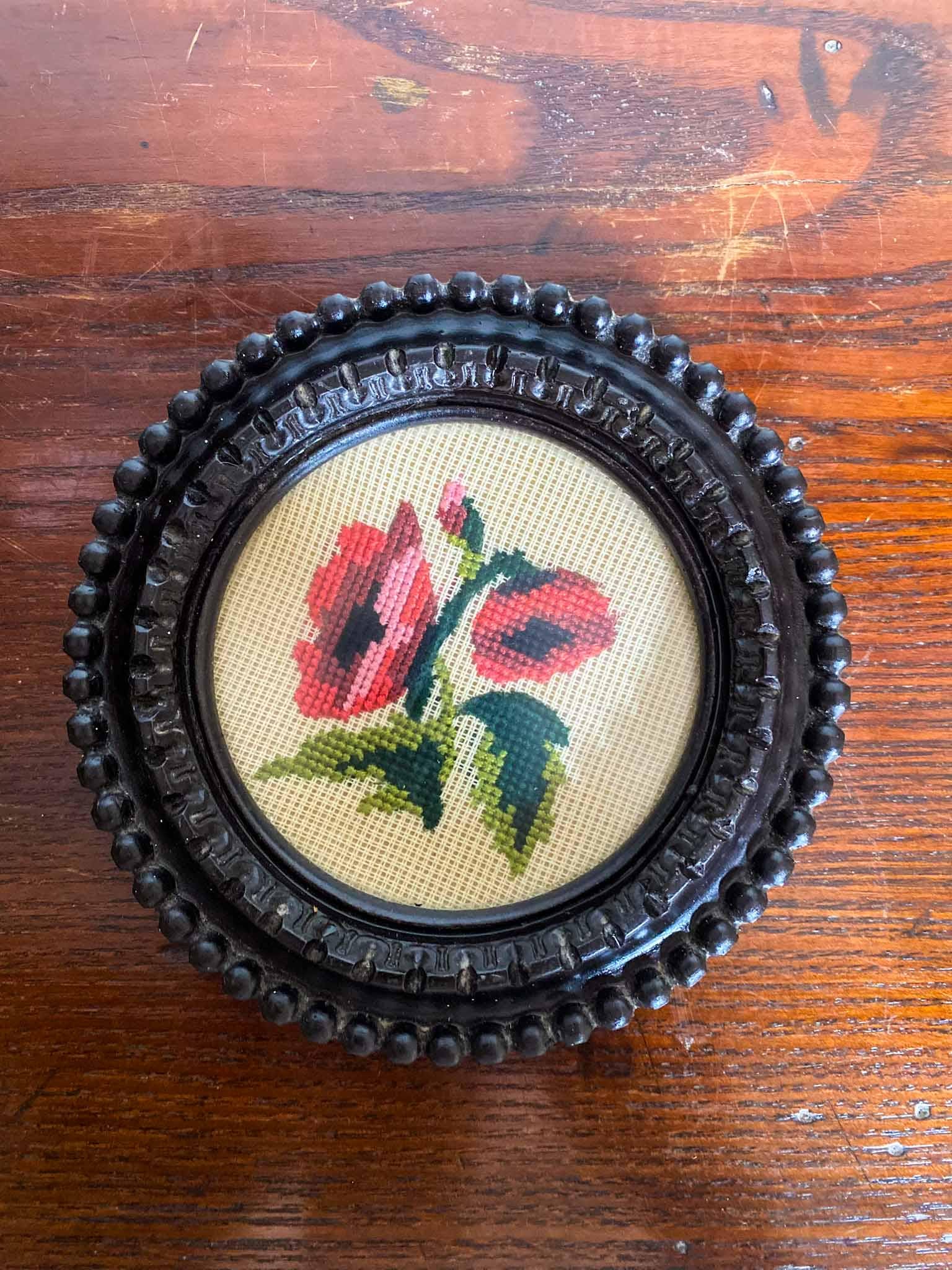 Cross-stitch roses in ebonised frame